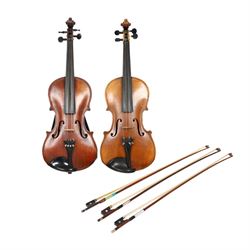 Two 19th century violins, each with two piece maple backs, ebonised wooden pegs and finger...