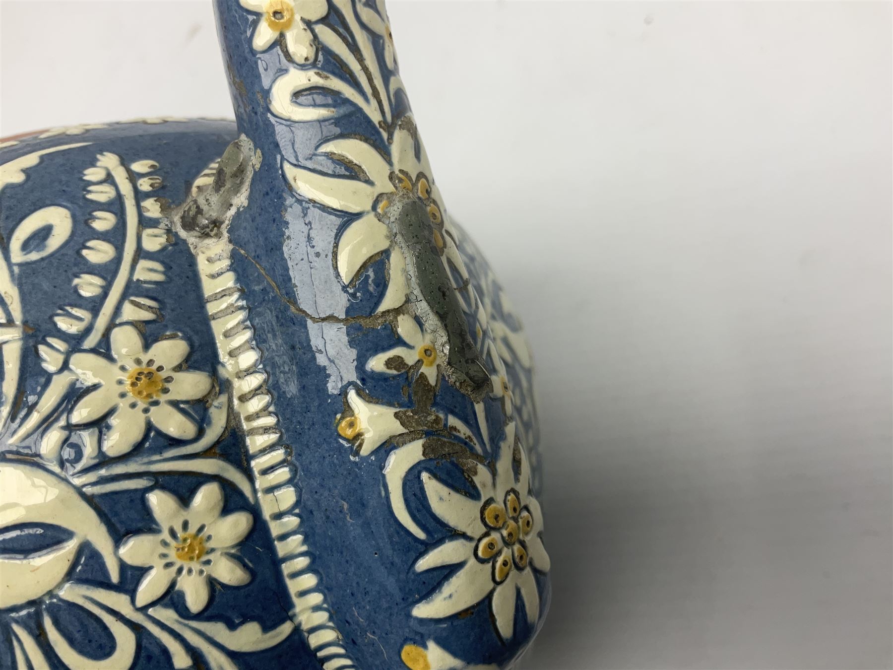 Swiss Thun pottery teapot and cover, decorated with edelweiss flowers, H16cm