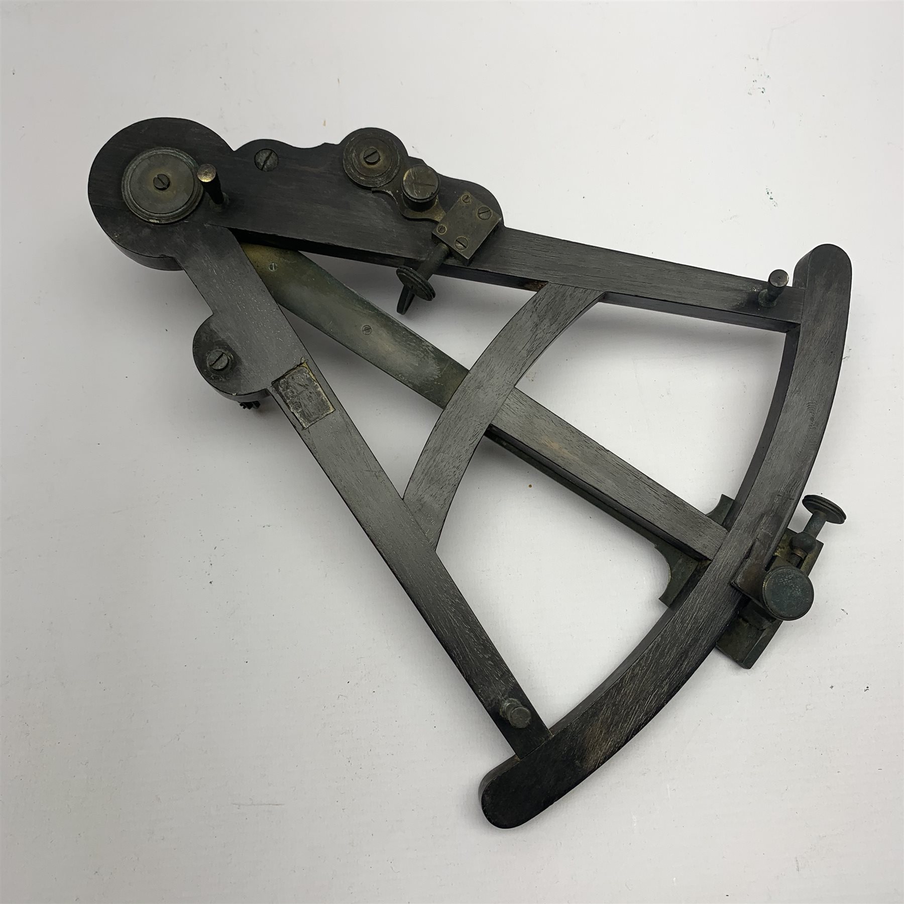 19th century octant, the rosewood framework with brass fittings and inset ivory scale, aperture for inset maker's plaque, L32cm