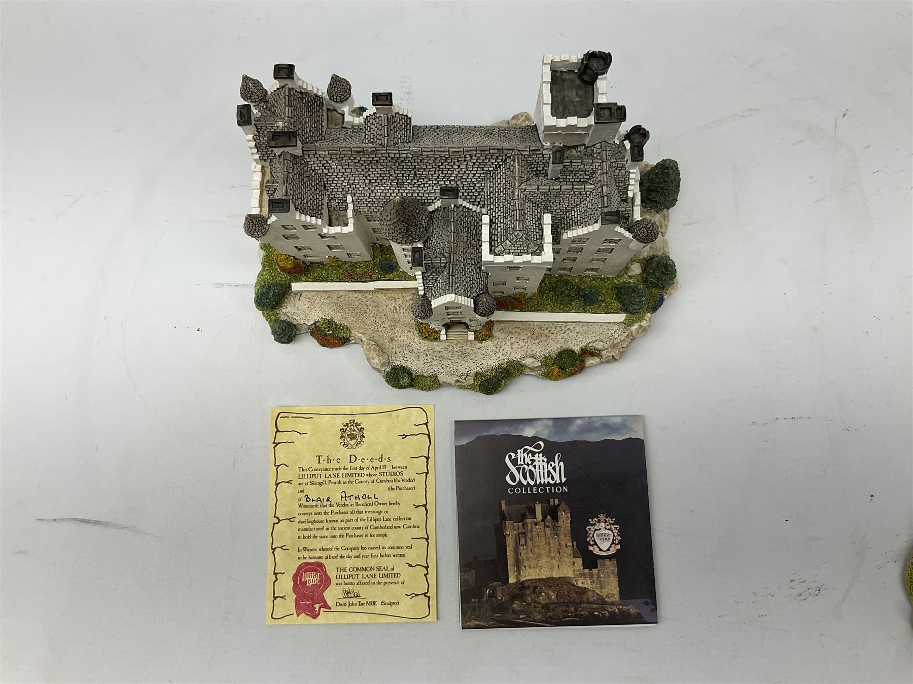 Two limited edition Lilliput Lane cottages, comprising Oakwood Smithy and Blair Athol, both boxed with deeds