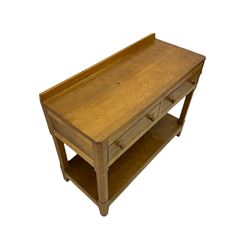 'Rabbitman' oak side table, adzed top over two drawers and adzed undertier, octagonal supports, carved with rabbit signature, by Peter Heap of Wetwang