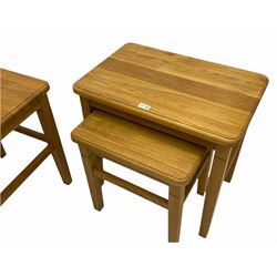 Clemence Richards - oiled oak nest of two tables (W61cm, H57cm, D41cm), and matching lamp table (50cm x 50cm, H57cm)