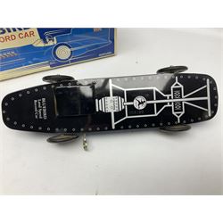 Schylling Collector Series clockwork tin-plate Sir Ian's Bluebird Land Speed Record Car with key and paperwork No.006080; boxed; and clockwork silvered tin-plate model of an 0-6-0 locomotive; unboxed (2)