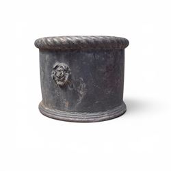 Pair of 19th century lead garden planters of cylindrical form, the rolled rope twist rims over a plain body decorated with applied flowerhead roundels, in antique weathered finish