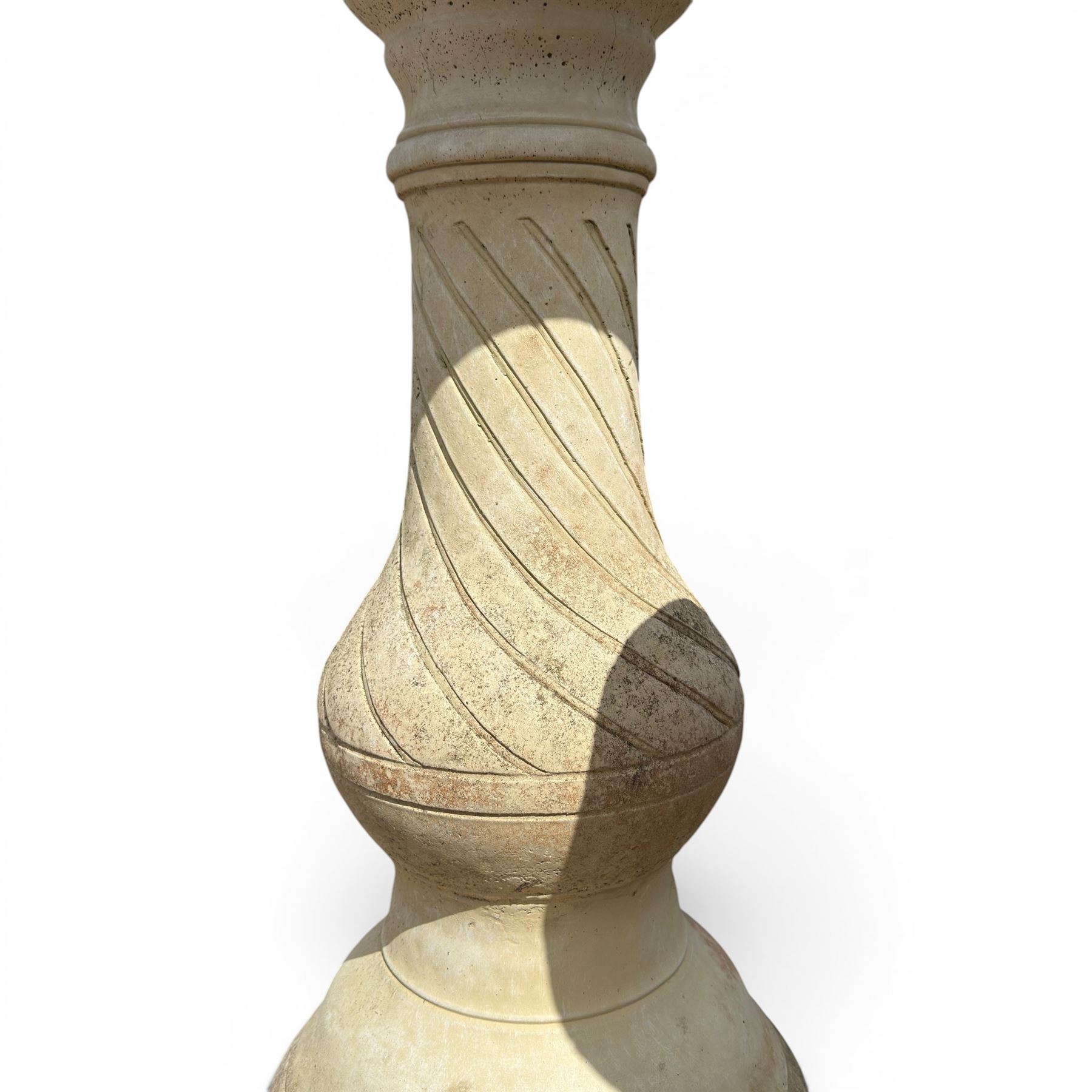Large cast stone bird bath, circular bowl on spiral column; and a small three piece bird bath (2)