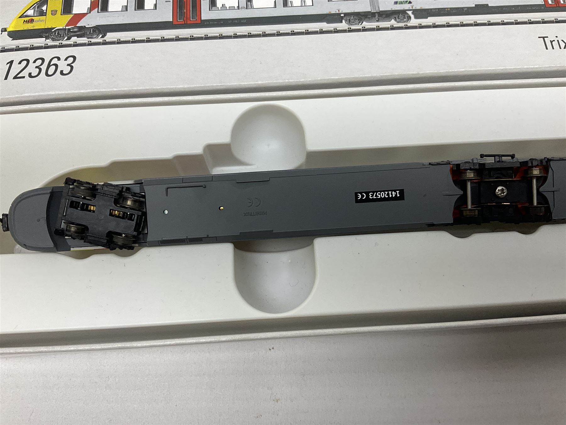 Trix Minitrix 'N' gauge - No.12363 'LINT' Diesel Powered Rail Car 'bendy' train; boxed; and No.11411 DB Zugset 'Danzas' goods set; boxed (2)