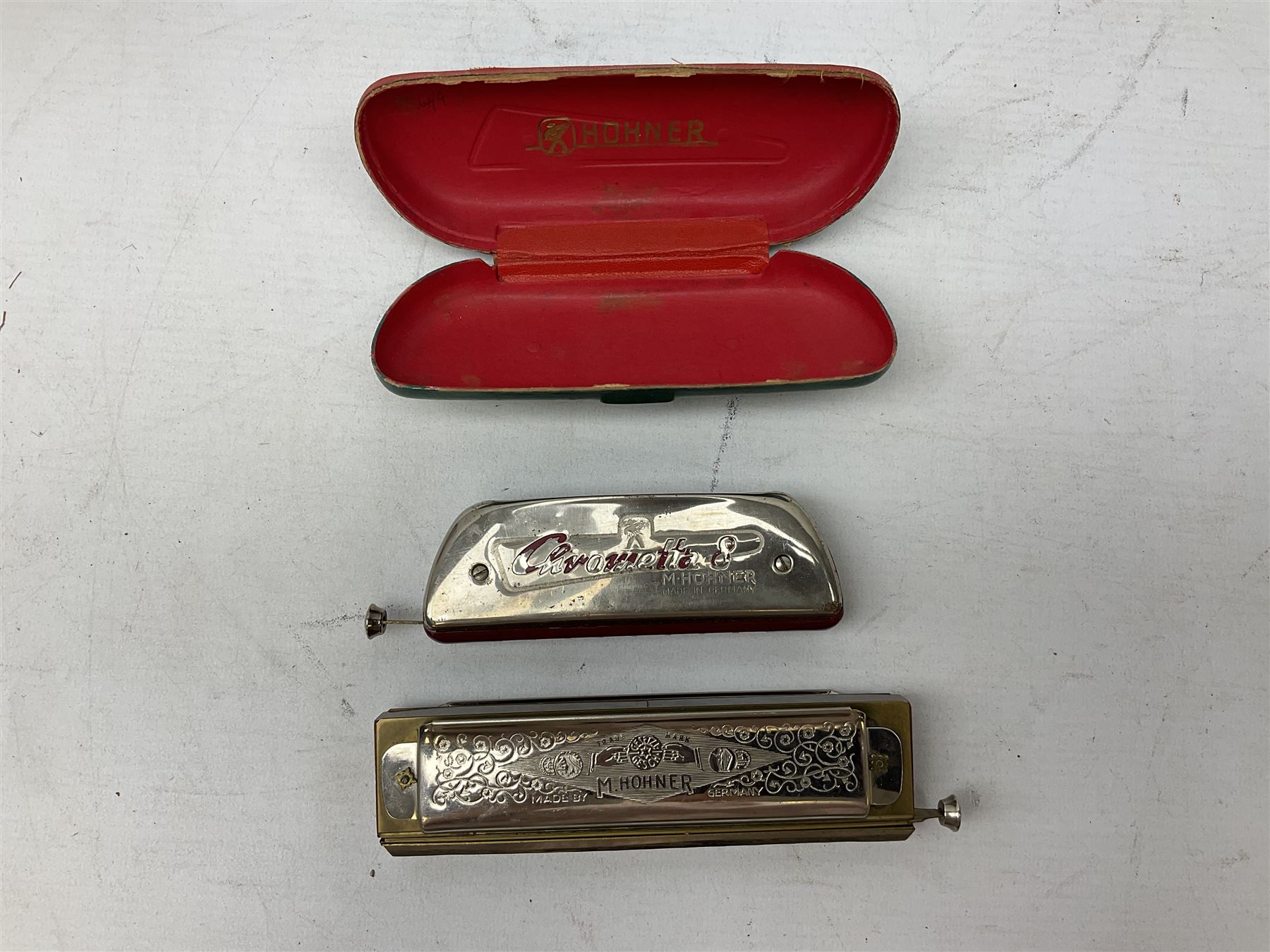 German M. Hohner Chrometta 9 harmonica in case, together with Hohner Chromonica harmonica