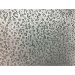 Arts and Crafts oak stand by Arthur Simpson of Kendal, of rectangular form with central hammered pewter panel, surrounded by a border with carved foliate corners, upon two bar supports, bearing label detailed 