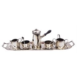 Edwardian miniature silver tea set, comprising hot chocolate pot, two cups and saucers, milk jug, sugar bowl and tray, hallmarked Cornelius Desormeaux Saunders & James Francis Hollings (Frank) Shepherd, Chester & Birmingham 1908, with two spoons and pair sugar tongs, hot water pot H3.8cm