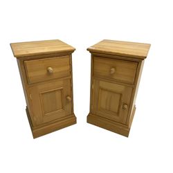 Pair traditional pine bedside cabinets, single drawer over cupboard