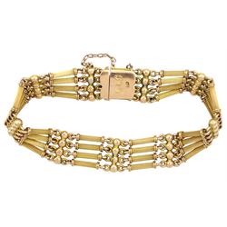 Early 20th century 15ct gold bead and bar bracelet, stamped 15