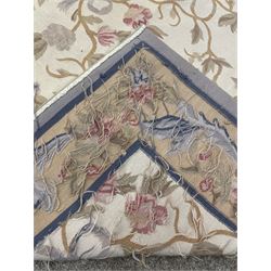 French style Aubusson rug, the pale ground field decorated with interlacing foliage and flower heads, repeating border 