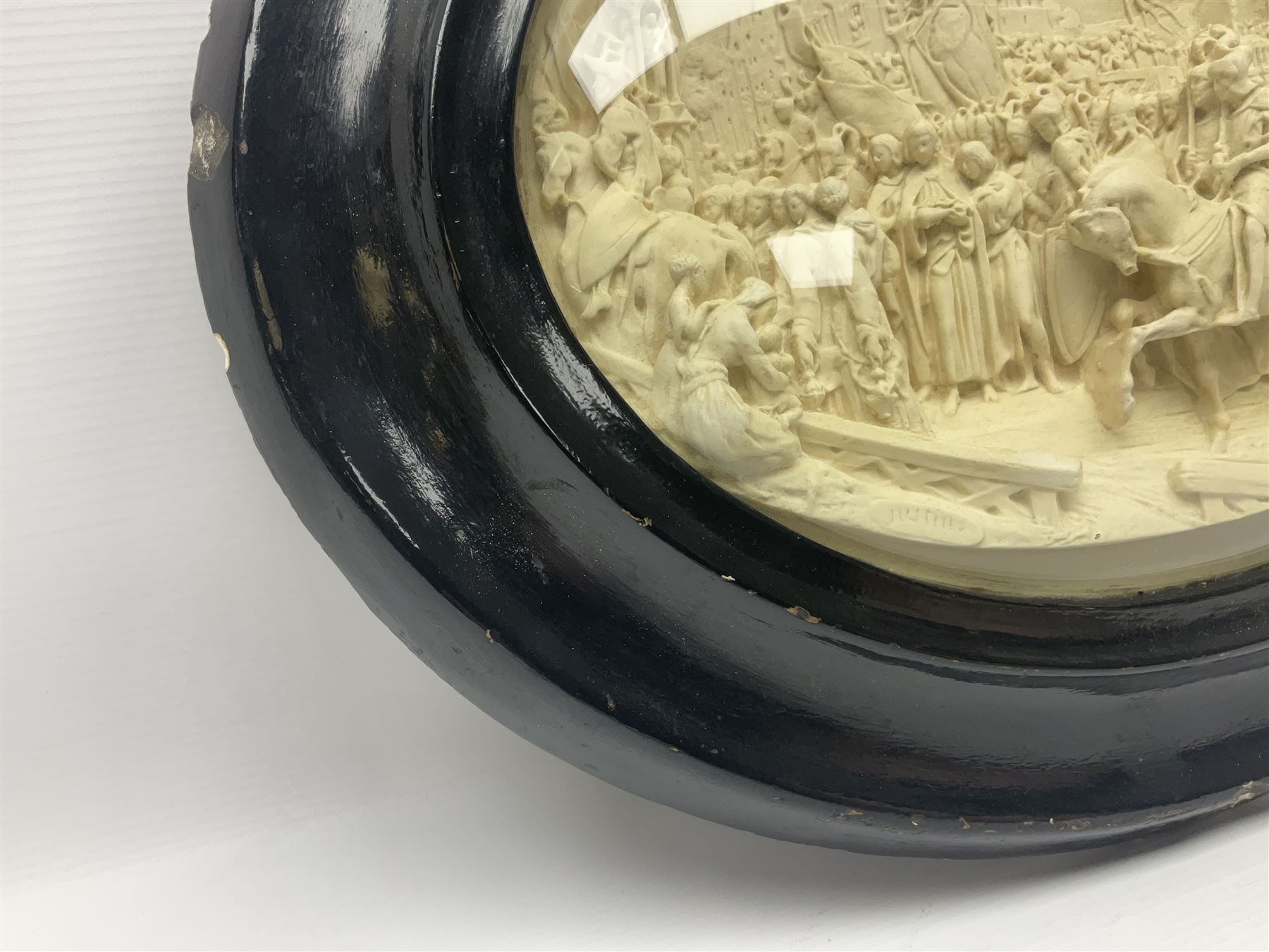 Justin Mathieu; oval high relief plaque depicting a battle scene, within frame H36cm