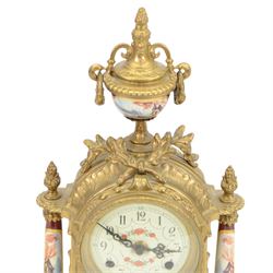 Continental-20th century clock garni in a mid 19th century style case, with porcelain panels and dial, spring driven two train movement with a floating balance escapement, striking the hours and half hours on two bells. With conforming urns. 