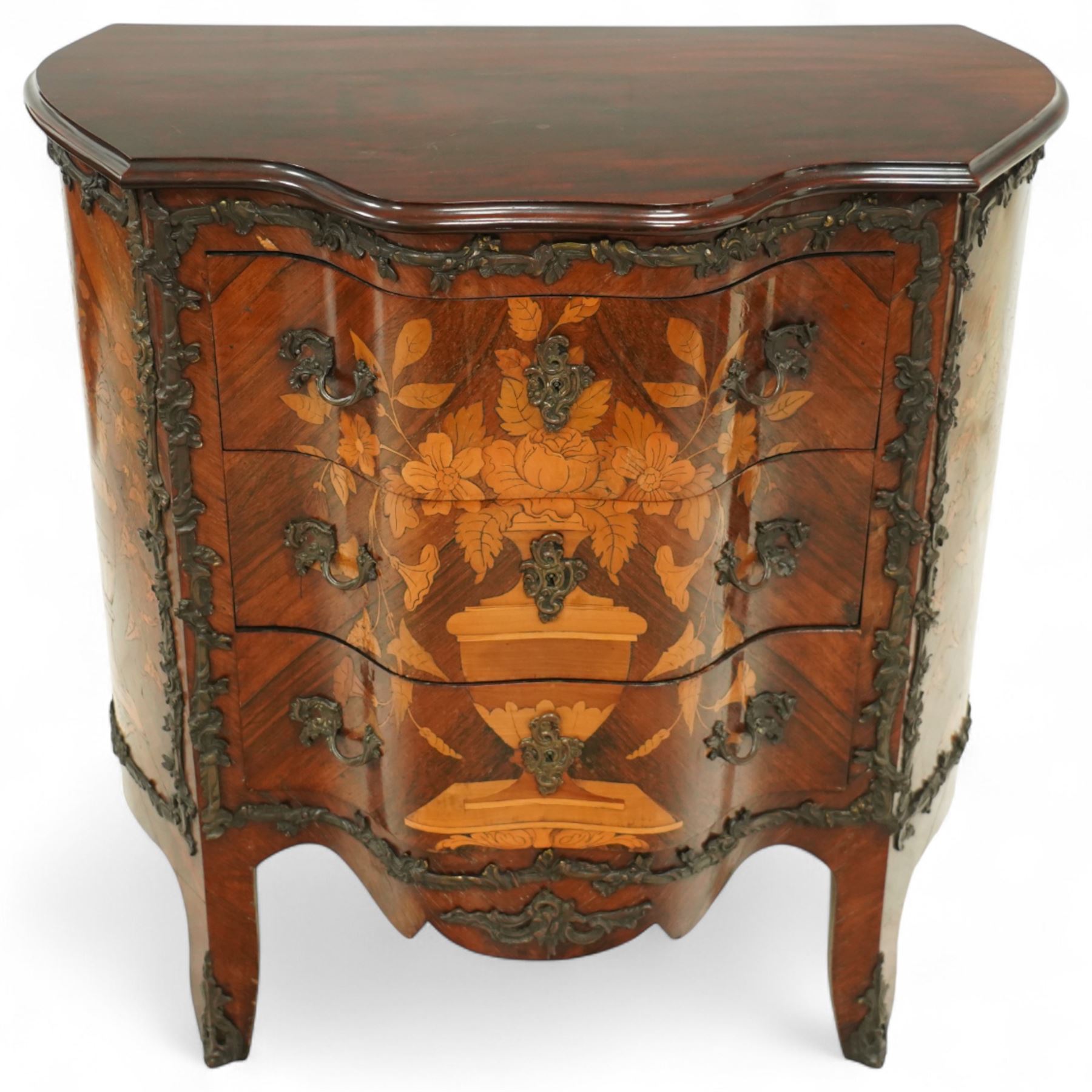 French Louis XV design serpentine fronted rosewood and fruitwood commode, the later shaped mahogany top over  three drawers, inlaid with a floral marquetry urn and flowers, within ormolu mounted borders, the sides inlaid with matching bouquet marquetry, raised on bracket feet