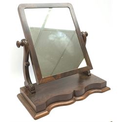A Victorian mahogany toilet mirror, with curved supports, overall H59cm. 