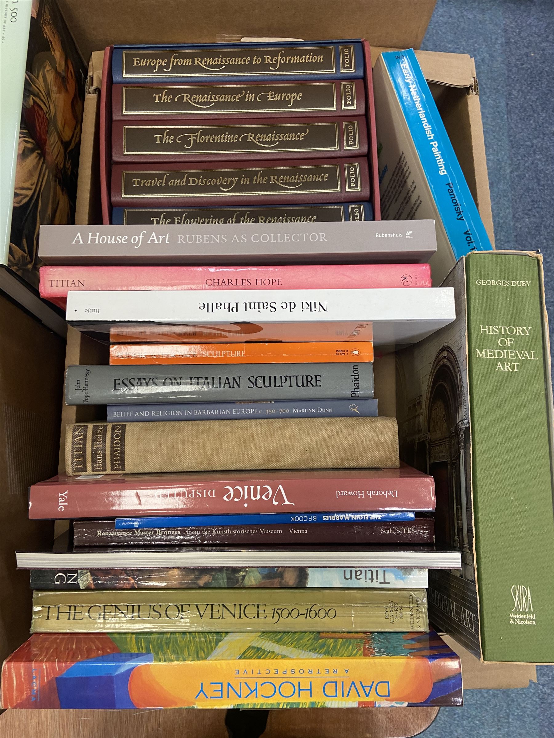 Large quantity of art reference books predominantly in English, to include David Hockney a Retrospective, The Folio Society; The Story of the Renaissance, Henry Moore, etc in four boxes   