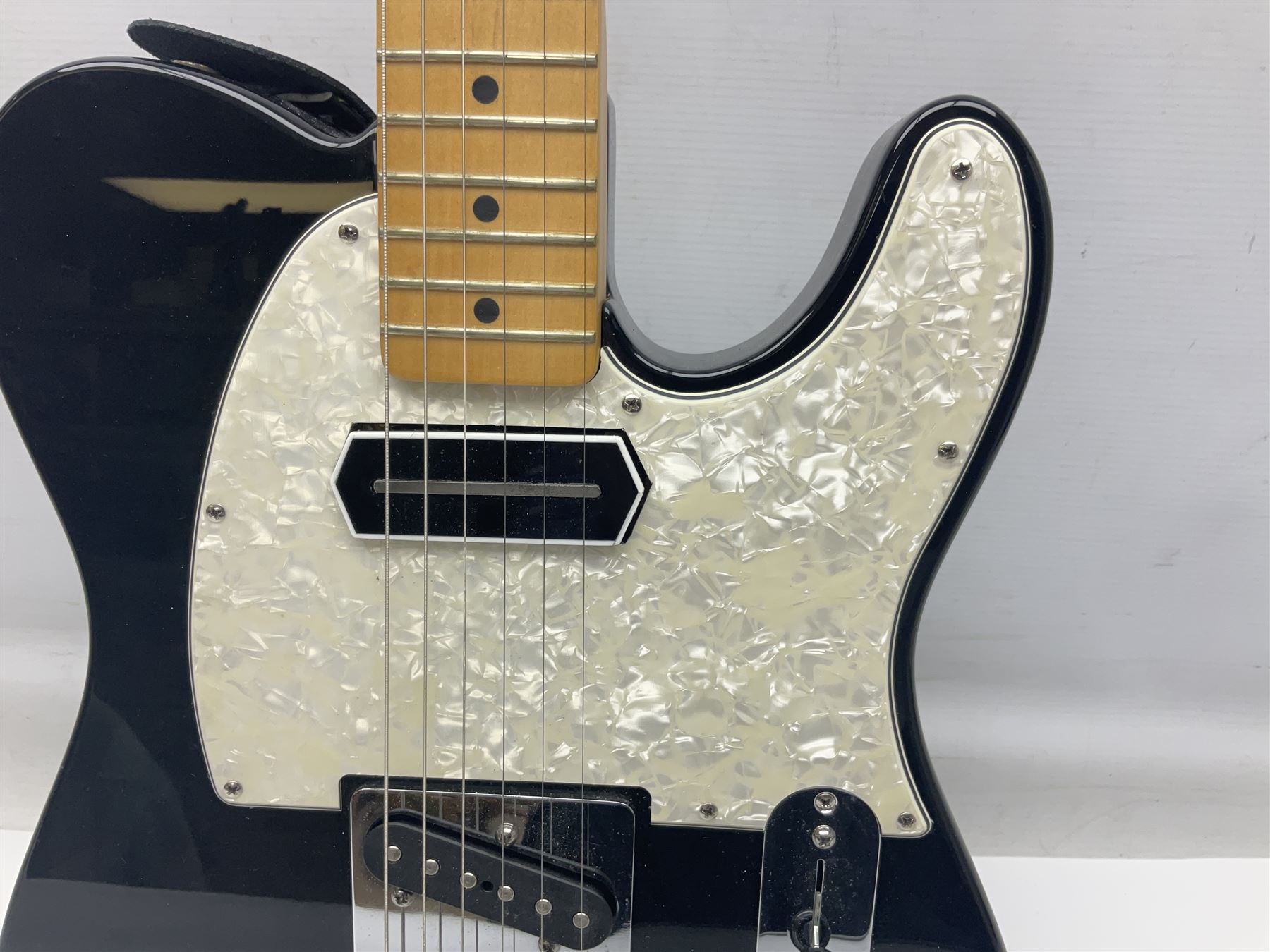 2009 Fender Telecaster electric guitar in black, retro fitted with Charlie Christian copy pick-up, serial no.MZ9546274; L98cm; in Fender soft carrying case