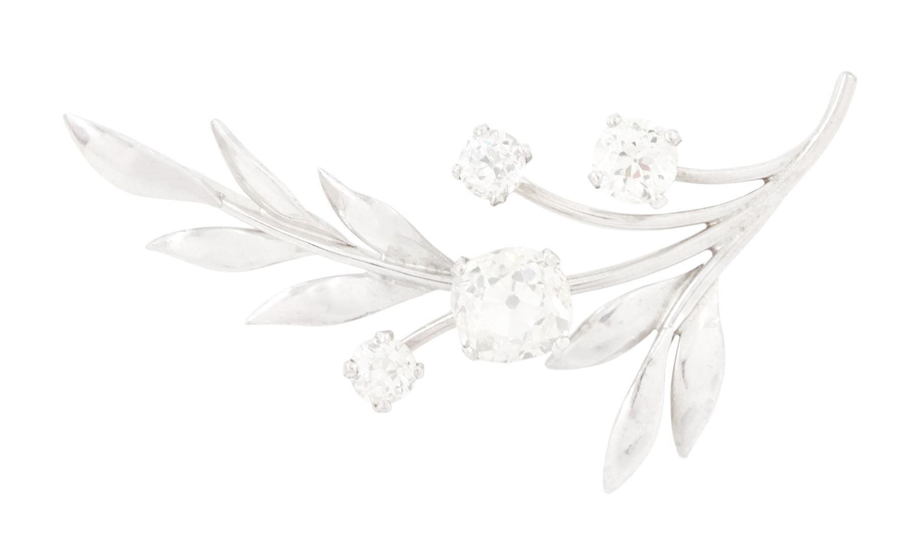 18ct white gold diamond flower brooch, set with a principal old cut diamond of approx 1.00 carat, surrounded by three further old cut diamonds, total diamond weight approx 1.75 carat