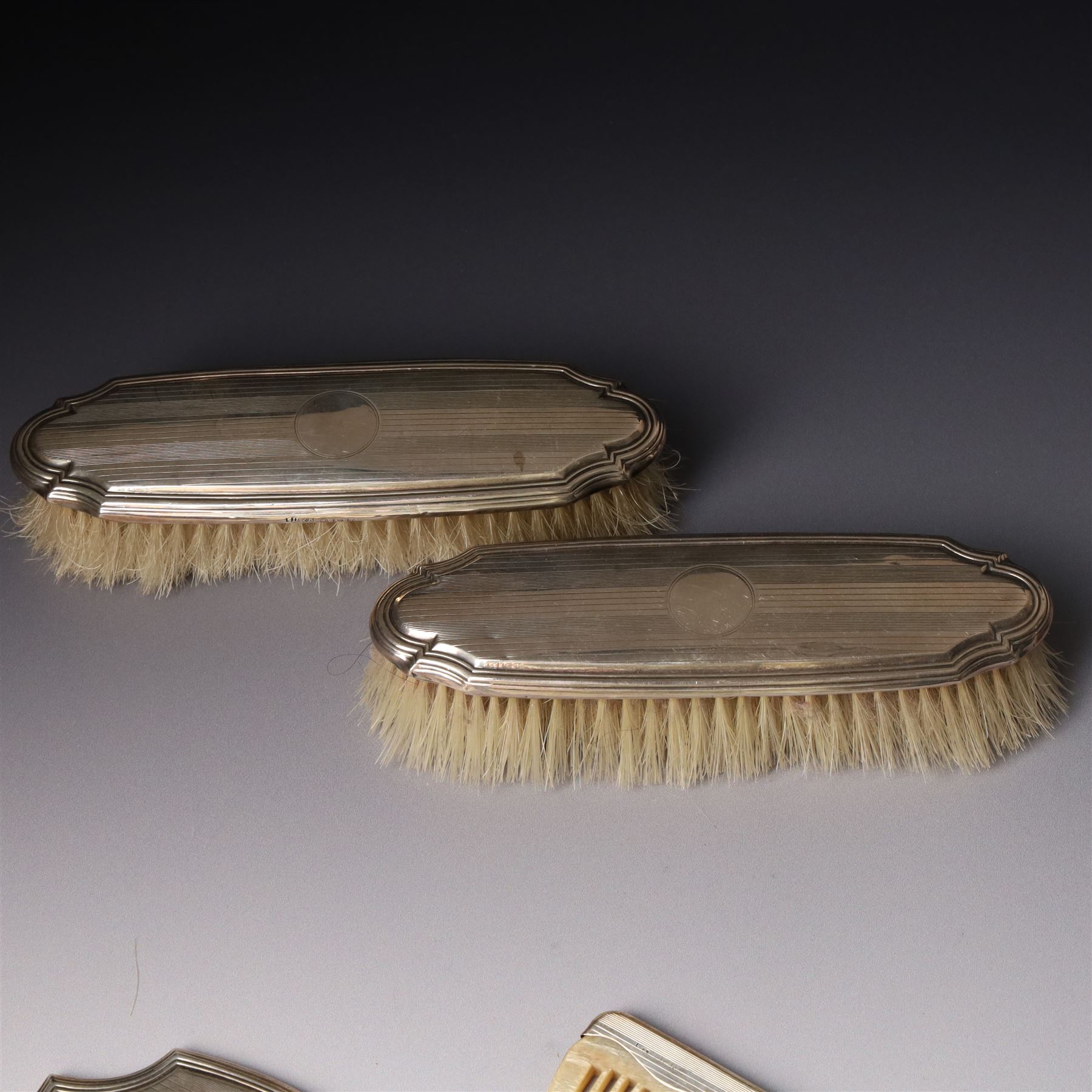 Five piece engine turned silver backed dressing table set Birmingham 1923/24 Maker Docker & Burn Ltd