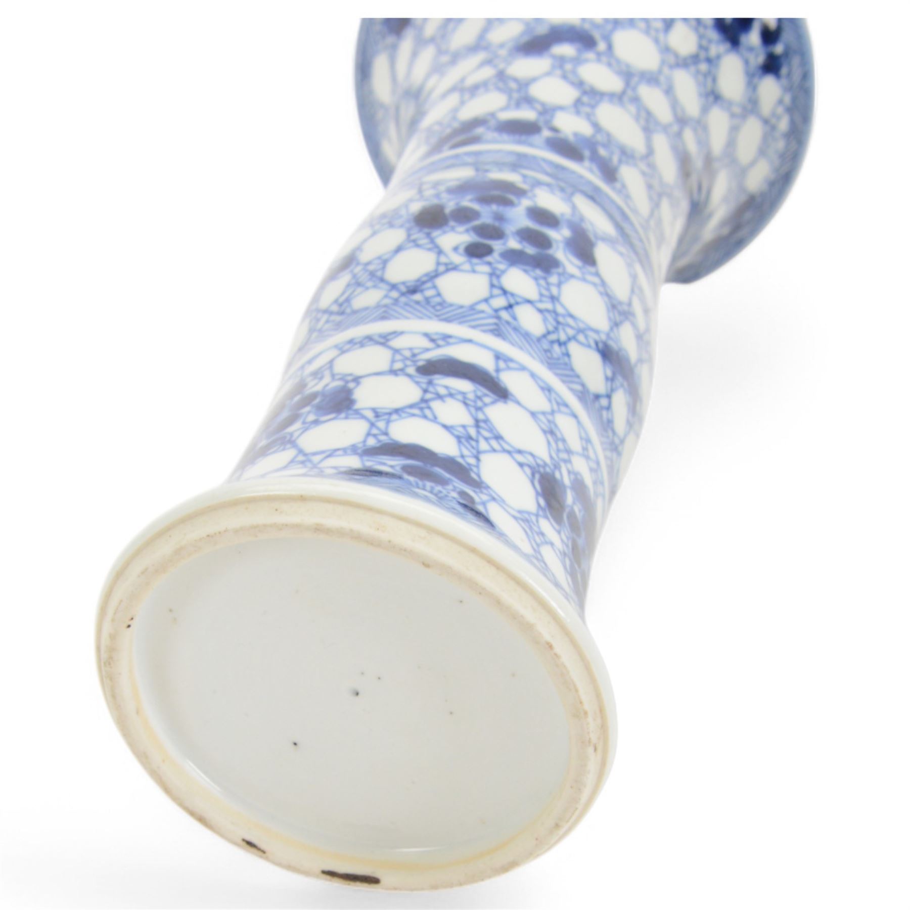 Chinese blue and white vase of cylindrical form, decorated with dragons amongst foliage, together with two other vases 