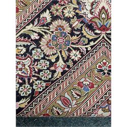 Finely knotted Persian Qom silk rug, overall pink ground with ivory field, the field with central cusped medallion profusely decorated with interlacing foliate and stylised flower heads, multiple band boarder, the main band decorated with a series of stylised motifs and trailing foliage, the outer guard with signature panel 