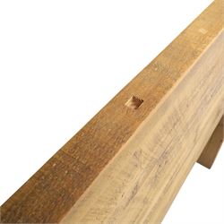 Alexander Ellis of Beverley - rustic pine king sized bed, of plank form construction with visible dowels, raised on stile supports