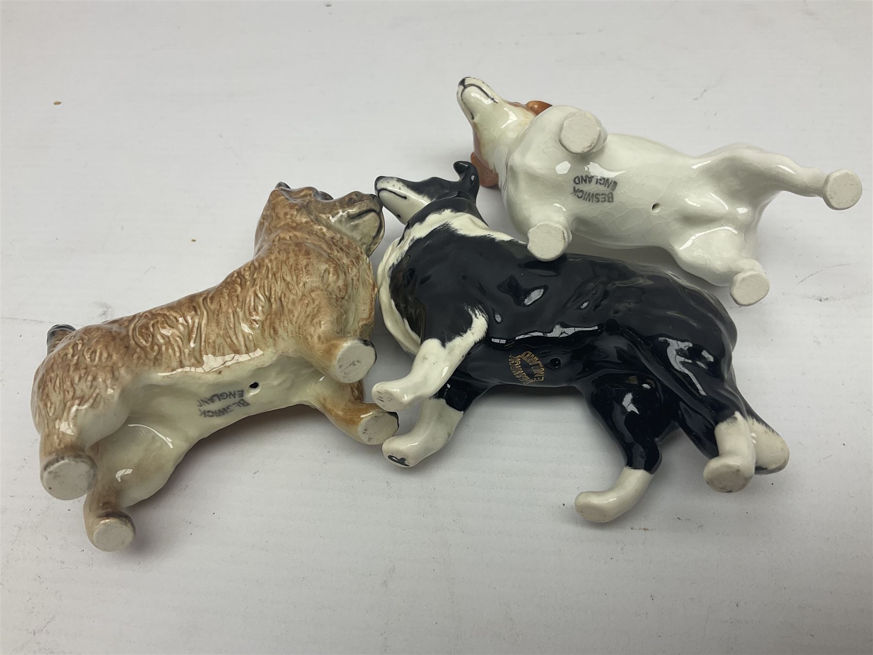 Seven Beswick figures, to include King Charles Spaniel 2107A, ginger cat 1898, Jack Russell 2109 etc