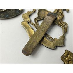 Twenty cap badges including Hertfordshire, Royal Sussex, Cambridgeshire, Hampshire, Notts and Derby, East Surrey, Herefordshire, South Lancashire, Devonshire, Bedfordshire, Durham Light Infantry etc (20)