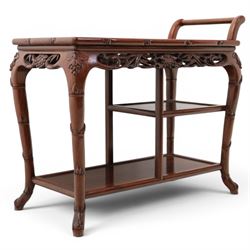 20th century Chinese ornately hardwood tea trolley, rectangular top with handle, pierced f...