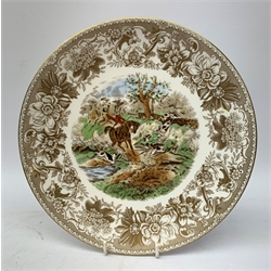  A collection of hunting related items, comprising a pair of Caverswall beakers, each with twin gilt fox head handles, H11.5cm, a limited edition Spode cabinet place depicting 'Drawing the Dingle' after J F Herring Sen, D24cm, and a set of six French shot glasses, decorated with huntsmen on horseback and hounds, H5.5cm.  