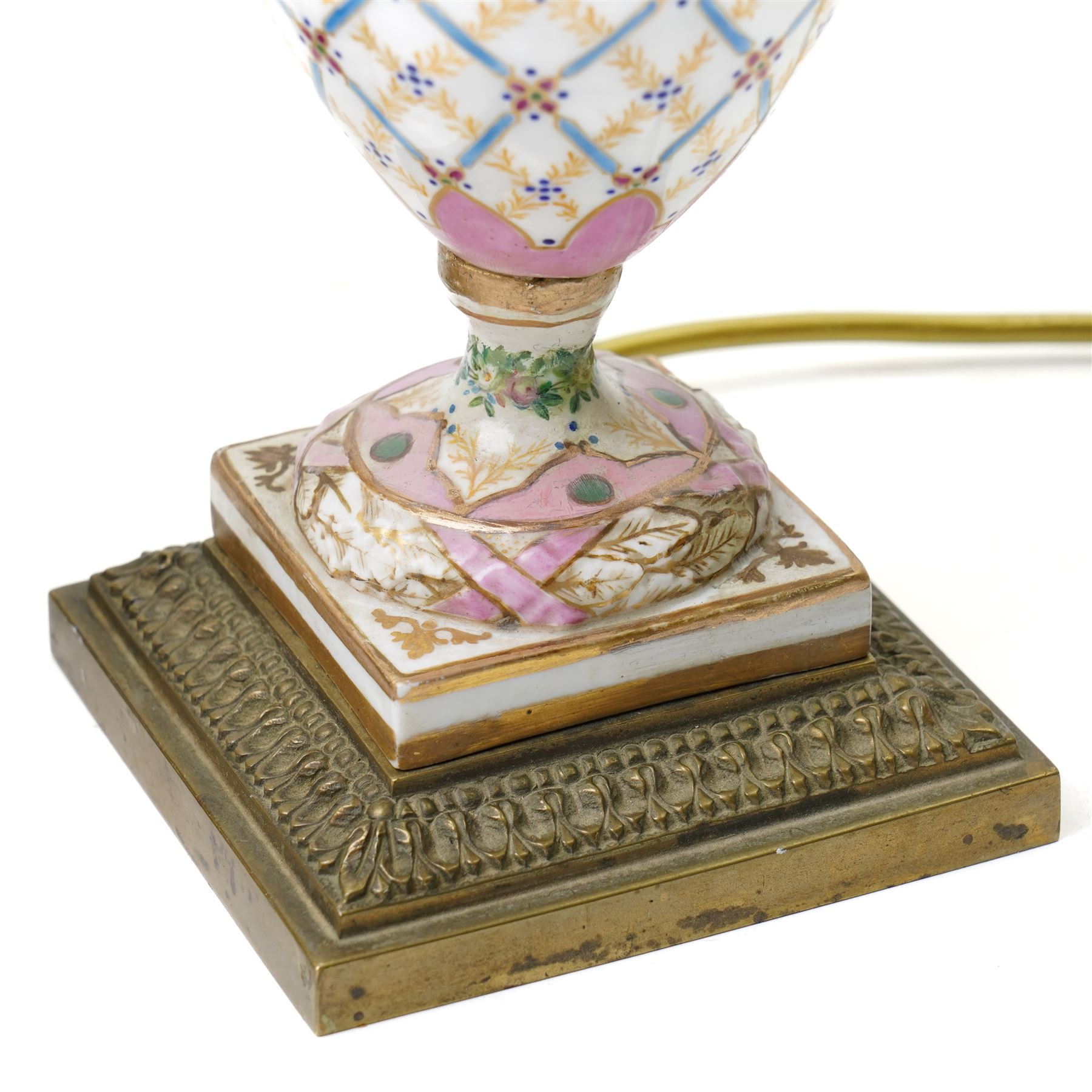 Pair of Sevres style table lamps, with pink and gilt floral decoration, apocryphal marks to bases, H32cm (2)