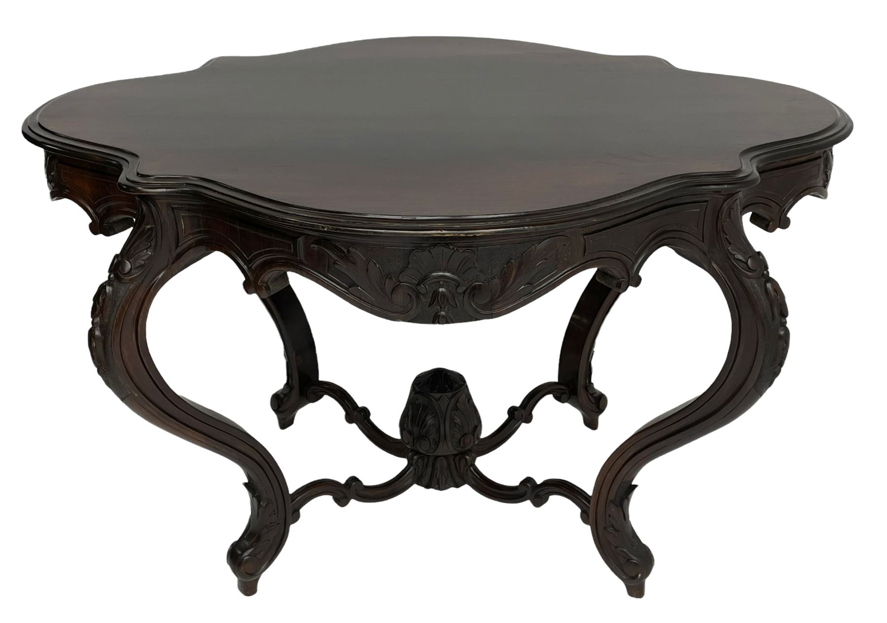 19th century Irish rosewood centre table, the shaped and moulded top over shaped apron carved with scrolled foliage, on serpentine supports carved with bell flowers, the supports united by anthemion carved finial and s-scroll x-framed stretchers