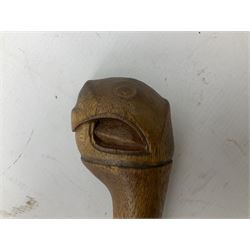 Malaysian parang survival knife the 29cm steel blade with character marks, cane bound teak grip carved with a stylised turtle head to the pommel, with matching teak scabbard L46cm overall