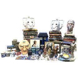 Quantity of Doctor Who annuals, yearbooks and related books etc, signed photograph of Peter Davison in black ink, quantity of toys to include Cybermen, Tardis and Dalek figures, masks, jewellery etc in five boxes