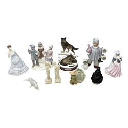 Quantity of figures to include The Bradford Exchange Winter Majesty Protectors of the Pack group, Coalport Ladies of Fashion Donna, The Leonardo Collection snowman and children figure group, Royale County Amy, decanter modelled as a drunk gent in nightwear holding bottle with four cups etc