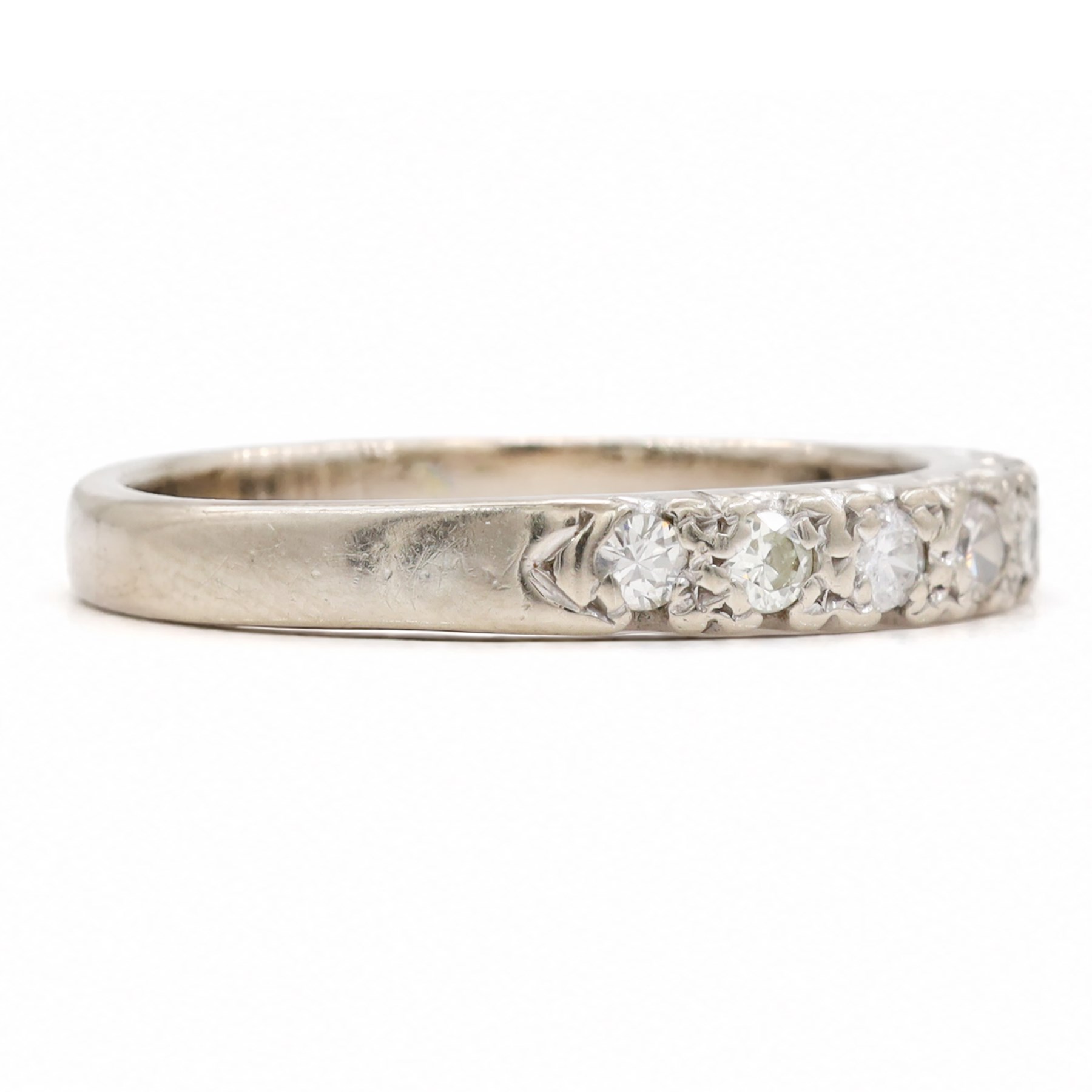 18ct white gold diamond half eternity ring, set with nine round cut diamonds, Birmingham 1965, total diamond weight approx 0.35 carat