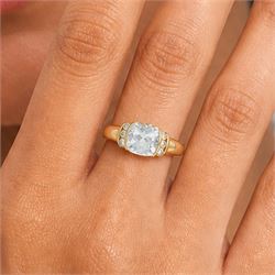 14ct gold aquamarine ring, single briolette cut aquamarine, with three round cut aquamarines set either side, stamped