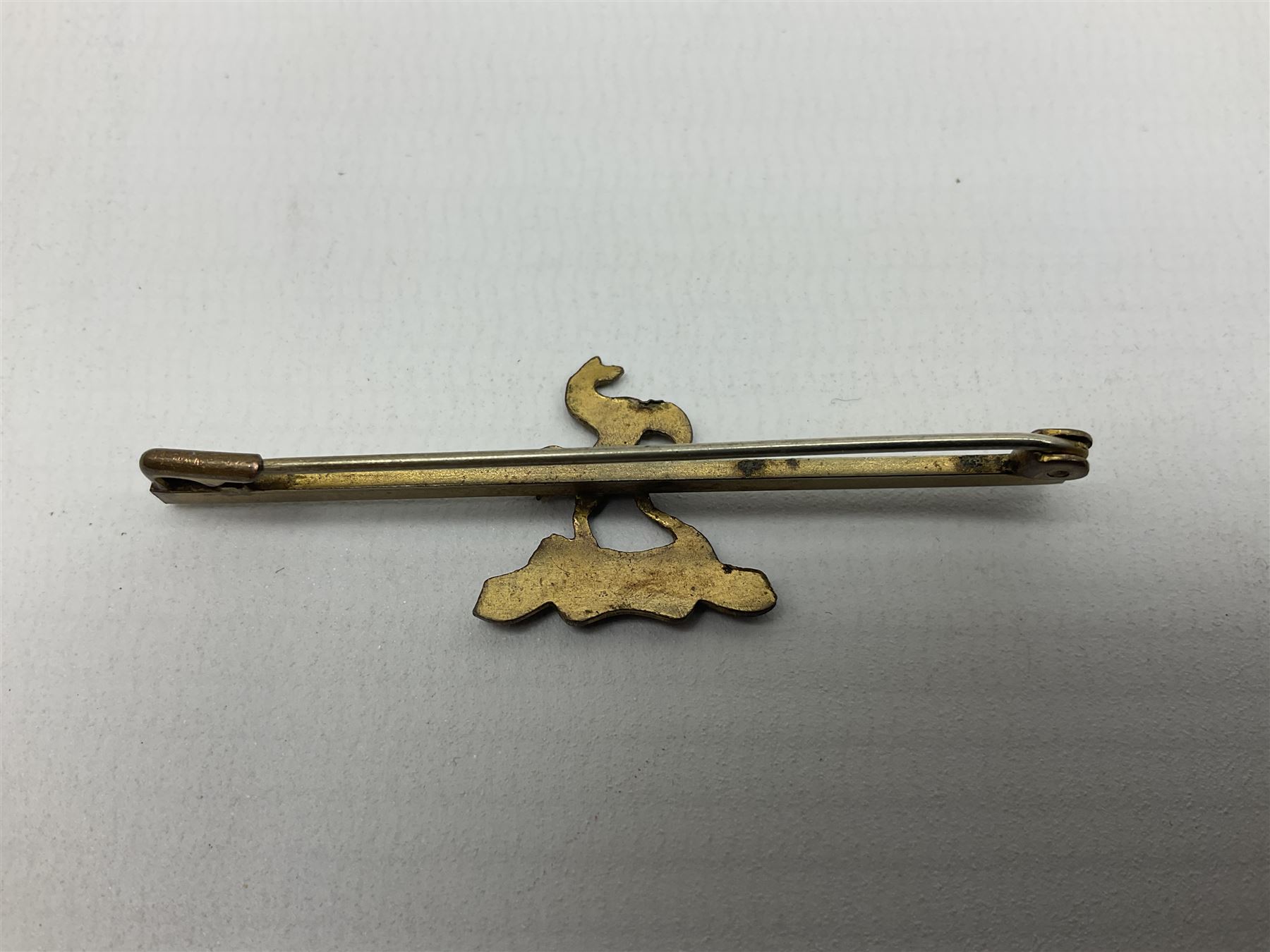 Royal West Kent regiment 9ct gold and enamel sweetheart brooch; The Queens Own regiment silver and enamel sweetheart brooch; and another sweetheart brooch for the Royal West Kent regiment (3)