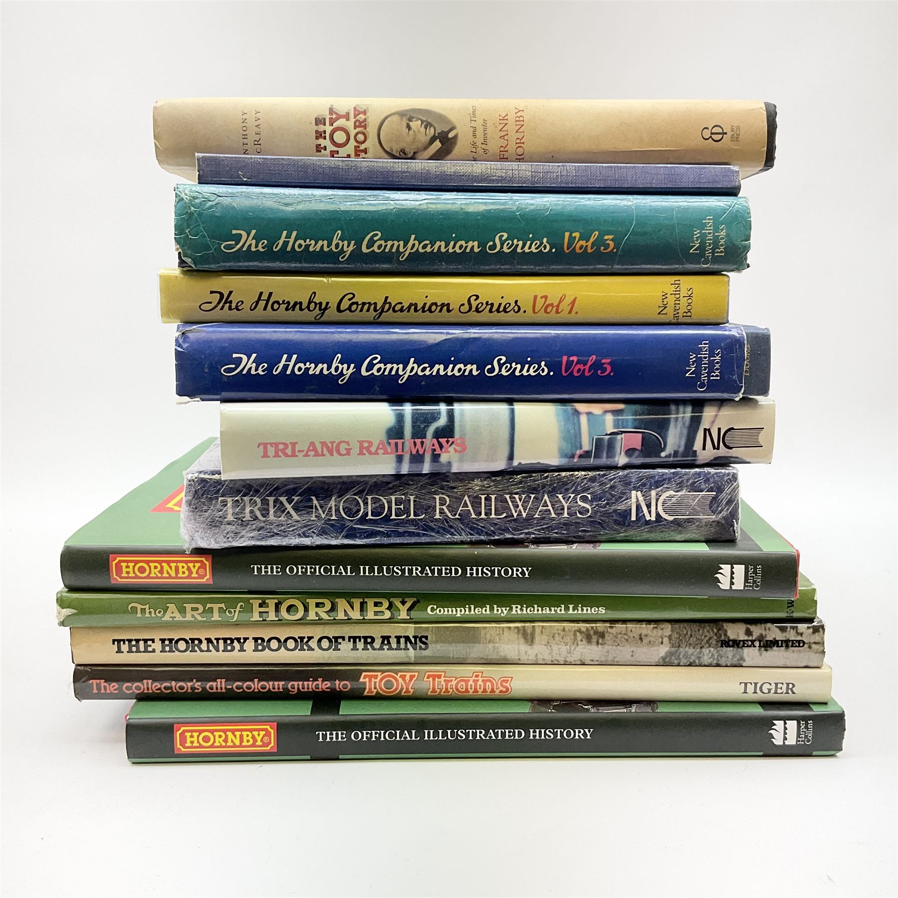 Twelve books of model railway interest including The Hornby Companion Series Vol.1, two copies of Vol.3 and Compendium 3A; Tri-ang Railways by Pat Hammond; The History of Trix by Tony Matthewman; The Toy Story - The Life & Times of Frank Hornby by Anthony McReavy; two copies of Hornby - The Official Illustrated History, etc (12)