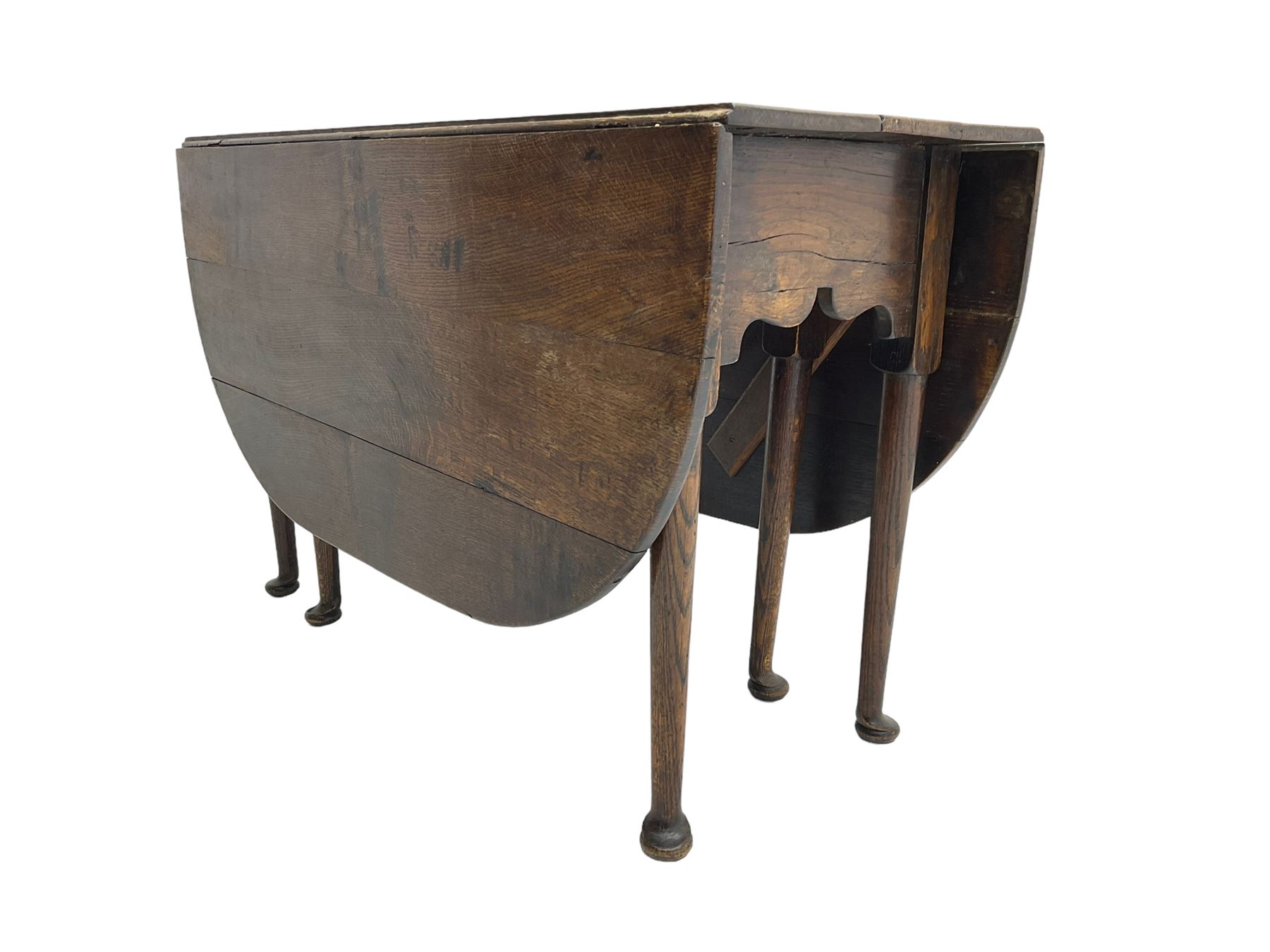 George III oak drop-leaf dining table, oval top over gate-leg action cabriole supports