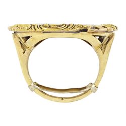 19th century gold portrait ring, set with a circular miniature of a young woman in 18th century dress on ivory, under a glazed panel, within a gold scroll frame and pierced gallery. This lot has been registered for sale under Section 10 of the APHA Ivory Act