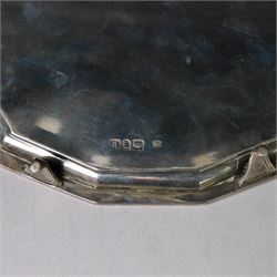 Victorian silver teapot stand, with chippendale style rim and engraved crest to centre, upon four pad feet, hallmarked Thomas Bradbury & Sons, London 1897, W18cm