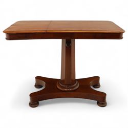 William IV mahogany reading table, the rectangular top with rounded corners and moulded edge, one end fitted with two hinged adjustable reading slops with two rests, the sliding top with a sprung stay mechanism, supported on a single tapered faceted column  with turned collar on a quatreform base with compressed bun feet
