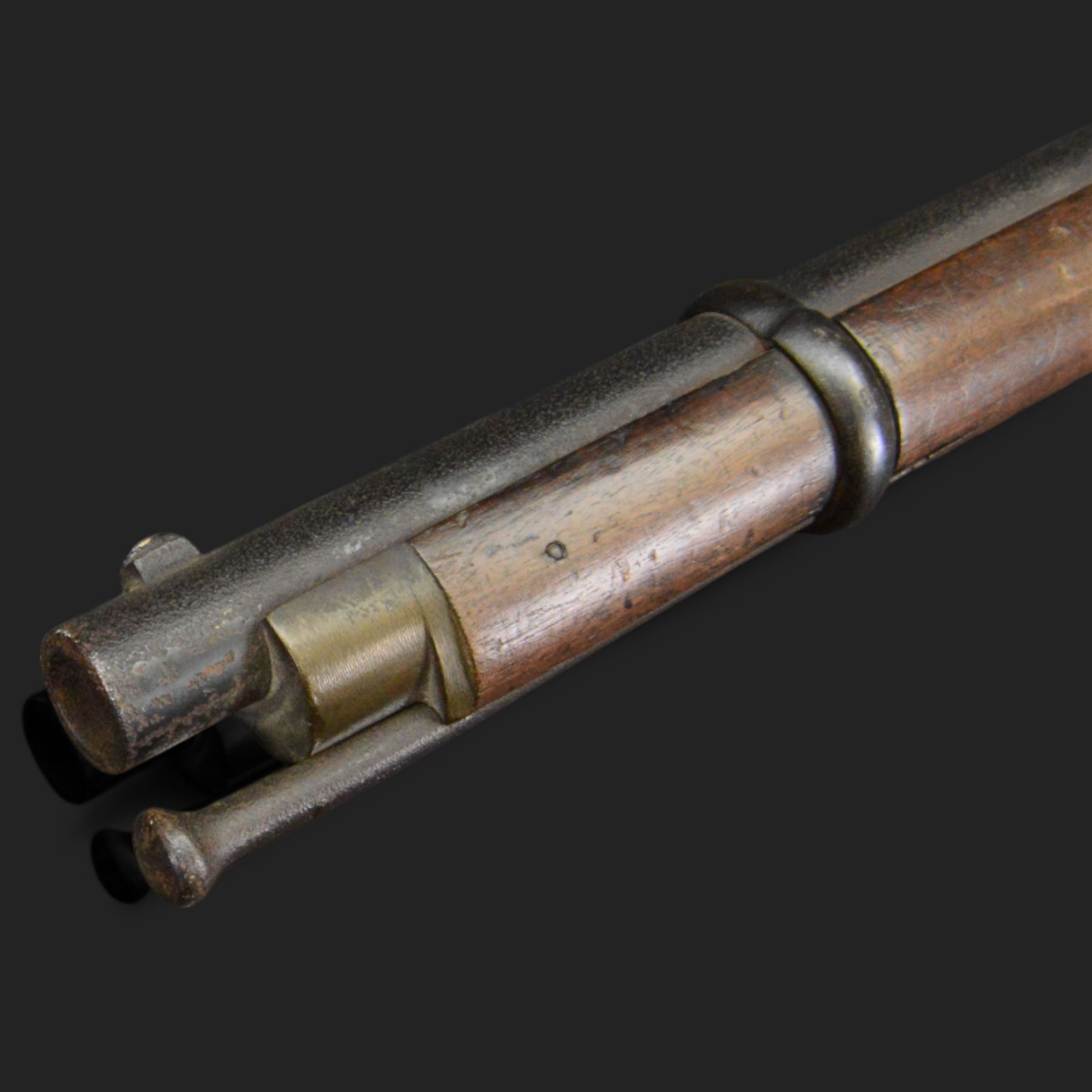 Two-Band short service musket, the L66cm barrel with sold out of service marks and indistinct marks, with ram rod beneath, the lock marked with crowned and Windsor 1855, overall L108cm
Sold as an exempt item under Section 58 (2) of the 1968 Firearms Act, to be held as a curiosity or ornament