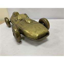 Large brass model of a vintage sport car with functioning wheels L57cm