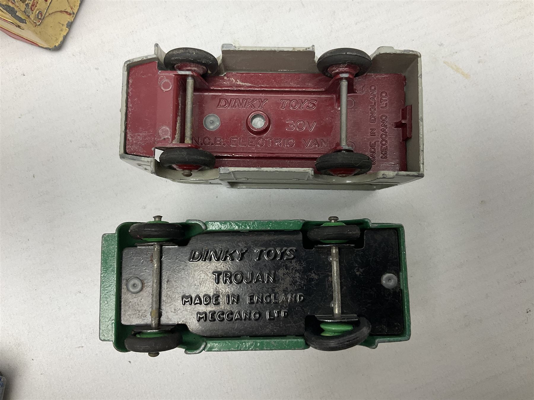 Dinky - Bedford 10cwt Van 'Kodak' No.480, boxed; and six unboxed and playworn models including Trojan Chivers Jellies van, loudspeaker van, Daimler Ambulance, N.C.B. Electric Van and two buses (7)