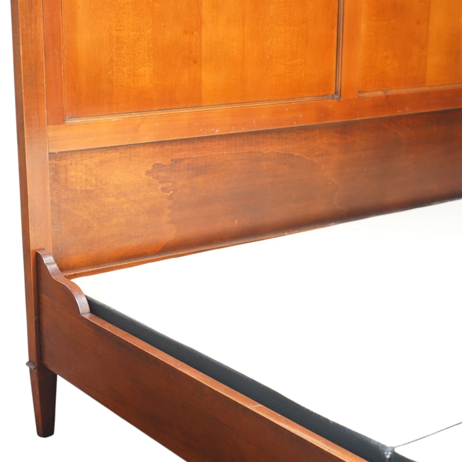 And So To Bed - cherrywood 6' super king 'Nathalie' bed, the panelled headboard and footboard with cylindrical rolled rails, decorative brass mounts to the corners, on square supports with cream and black edged fabric covered base panels 