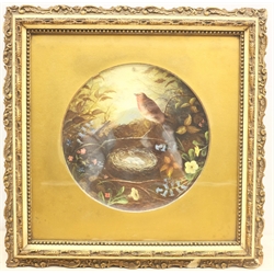 English School (19th century): Robin's Nest among the Flowers, oil painted on a pottery charger unsigned, 25cm diameter