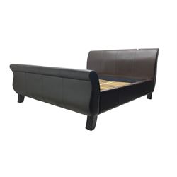 Super king 6' sleigh bed, upholstered in chocolate brown leather, with ebonised splayed feet